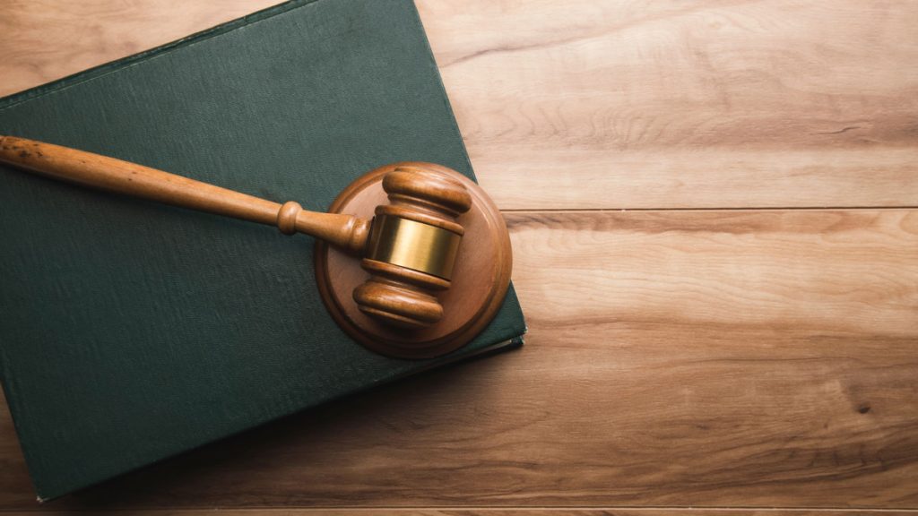 A gavel on a desk.