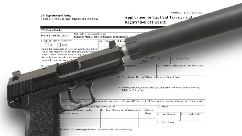 A pistol with a silencer attached to it and a tax stamp application in the background