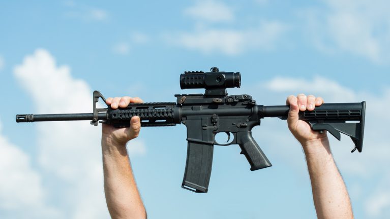 A person holding a so-called 'assault weapon'.